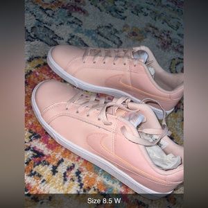 Never worn Nike court women pink shoes